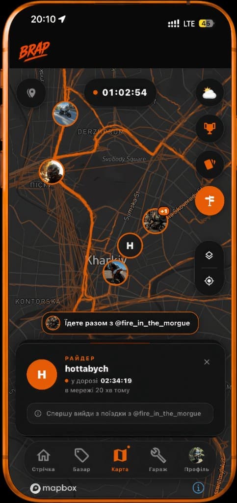 Rider card on the BRAP live map with an on-the-road status and ride duration